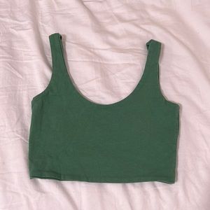 cotton on green top fits like an xs-s